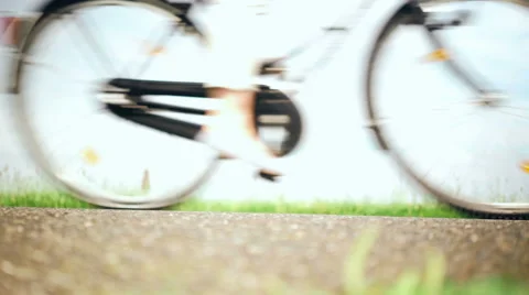 Bicycle wheels blurred on high speed Stock Footage 67676426