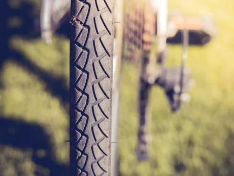  Bicycle wheels on grass Stock Photos