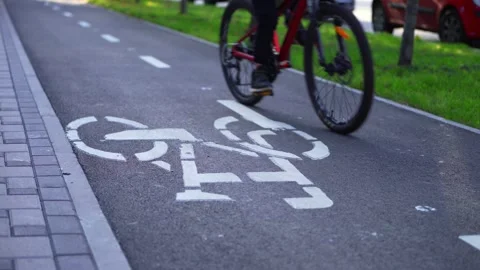 Bicycle Wheels on Marked Cycle Path Stock-Footage 331827125
