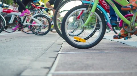 Bicycle wheels rolling across the road Stock Footage 58894777