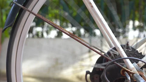 Bicycle wheels spinning Stock Footage 233575589