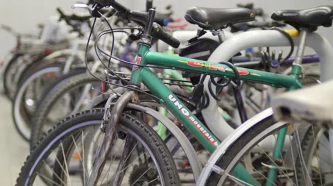 Bicycles are standing in a row. Close-up, rack focus 4K Stock Video Video stock 53420230