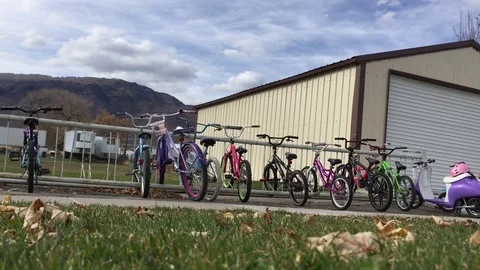 Bicycles lined up in school bike rack HD Stock-Footage 69759959
