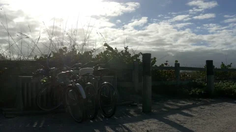 Bicycles parked on beach dunes, 4K Stock Footage 48430573