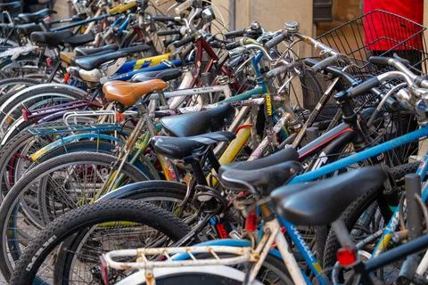 Bicycles parked in rows Stock Photos