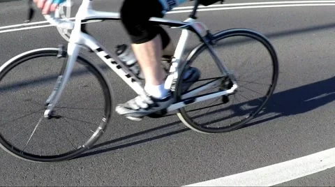 Bicycles pass on road slow motion Stock-Footage 54939281