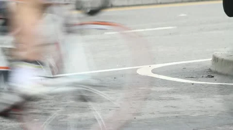 Bicycles race pass by in a blur Stock Footage 10818576