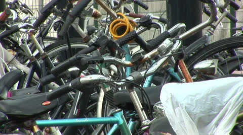 Bicycles in rack Stock Footage 25134076