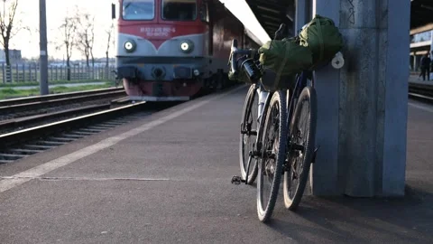Bicycles ready for adventure on a train platform 스톡 동영상 152217031