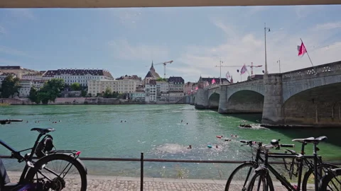 Bicycles by the Rhine with Swimmers and Stock Video Pond5