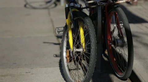 Bicycles on sidewalk Stock Footage 34027860