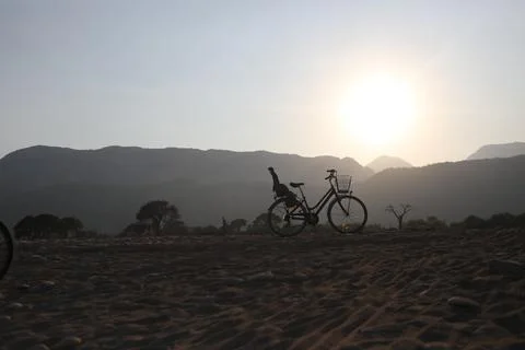 Bicycles at sunset Stock Photos