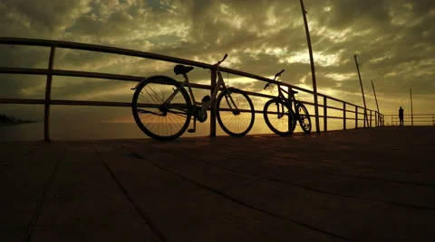 Bicycles at sunset sea Stock-Footage 54781808