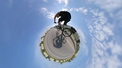 Bicycling. View of a small planet. 360 degree camera. Видео 145133280