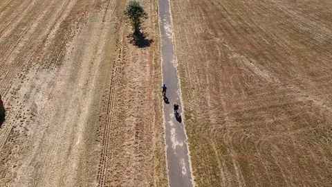 Bicyclist Aerial Tracking Stock Footage 105325269