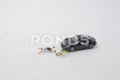 The bicyclist fallen down with serious injuries Stock Photos