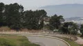 Bicyclist riding around Twin Peaks in San Francisco Bay Aerial View Skyline HD Footage