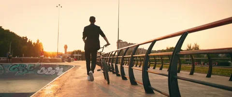 Bicyclist at sunset 1 Stock Footage 139845273