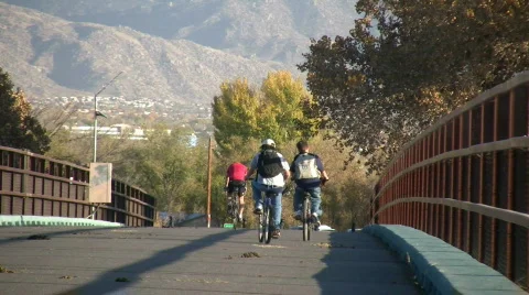 Bicyclists on a bridge Video stock 89480