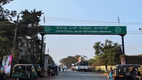Bidar central bus station with trees and vehicles at karnataka, india. day Видео 331162881