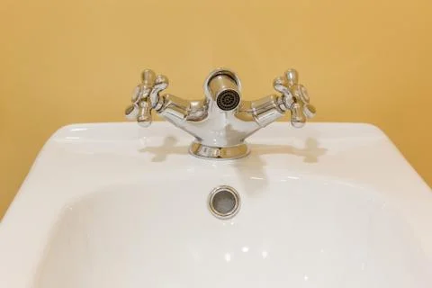 Bidet mixer on the modern bathroom Stock Photos