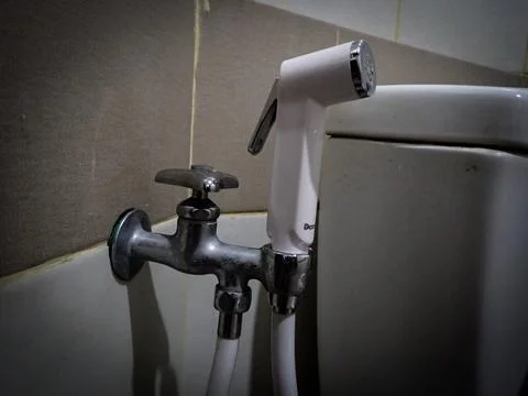 Bidet spray Stock Photos
