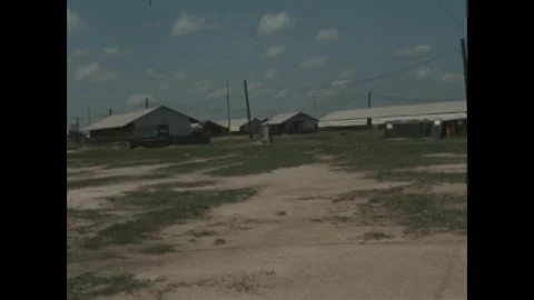 BIEN HOA - 1970: Base camp stores - Stacked corrugated bunker sections Stock Footage 343941900