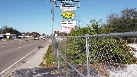 Biff Burger Old Restaurant St. Petersburg Florida Shut down Fenced In Stock Footage 231730414