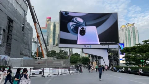 Big Advertising Screen at Central World Shopping Plaza Complex - people walking Stock Footage 172359069