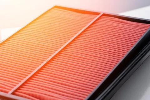 Big air filter, car the spare part on a white background Stock Photos