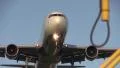 Big airplane flying overhead in the morning HD Footage