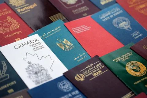 Big amount of passports of various different countries. Covers of expired Stock Photos