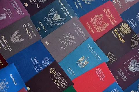 Big amount of passports of various different countries. Covers of expired Stock Photos