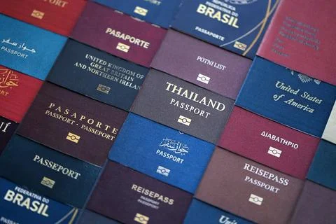 Big amount of passports of various different countries. Covers of expired Stock Photos