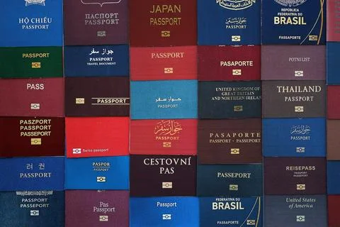 Big amount of passports of various different countries. Covers of expired Stock Photos