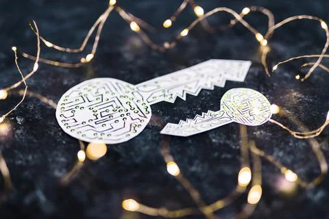 Big and small encryption key icon made of circuits and LED lights on dark bac Foto stock