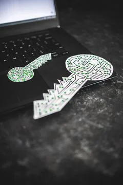 Big and small encryption key icons made of circuits and LED lights on top of  Stock Photos