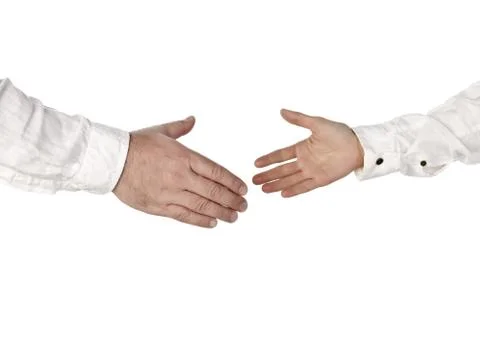 Big and small hands going to handshake Stock Photos