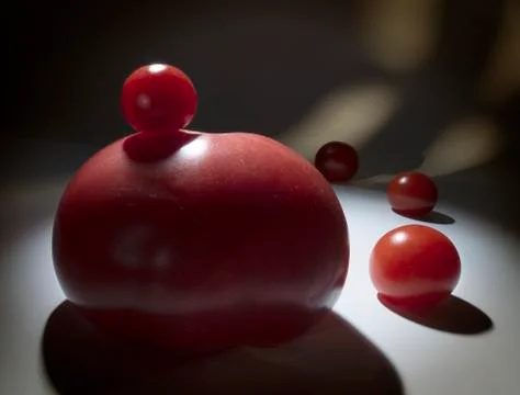 Big and small red tomatoes Stock Photos