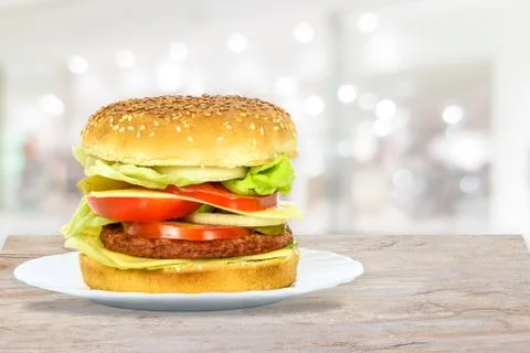 Big appetizing hamburger Stock Photos