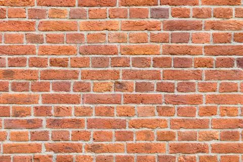 Big background of an old red brick wall Foto stock