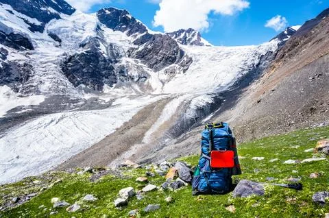 Big backpack on a background of mountains Stock Photos