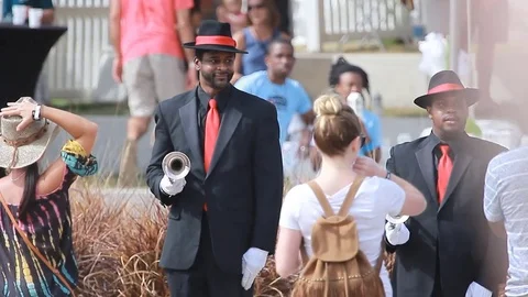 Big band playing and dancing at an open-air music festival in summer Stock Footage 73496235