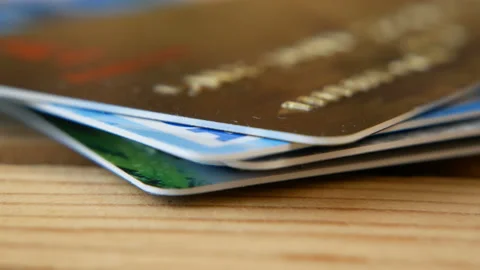 Big bank cards stack on wooden background, closeup Stock Footage 150456341