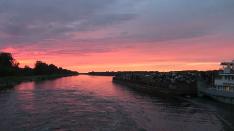 Big barge on the Volga at sunset Stock Footage 98493574