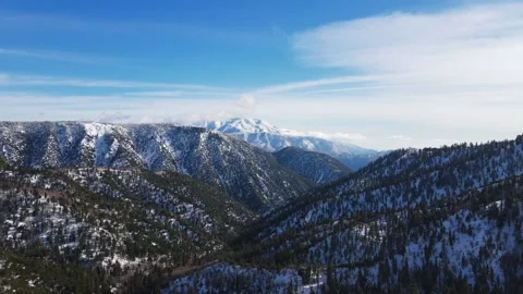 Big Bear Snowy Mountains by Drone Stock Footage 231069292