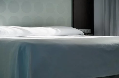 Big bed in apartment Фото