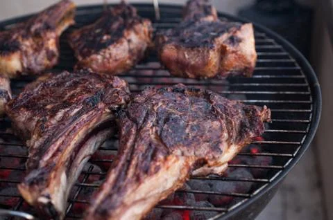 Big beef steaks on bone grilled  barbecue 스톡 사진