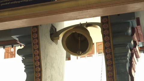 A Big Bell Ringing In The Hindu Temple, Kuala Lumpur, Malaysia. Video stock 122557364