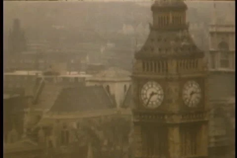 Big Ben and statue of Winston Churchill in London Stock Footage